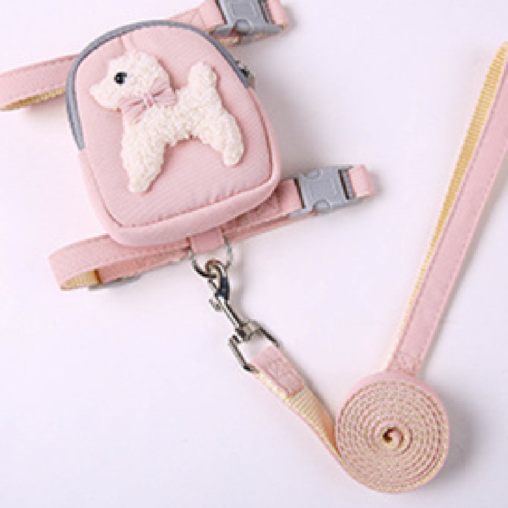 Pink pet leash and harness set with a small dog toy on a white background