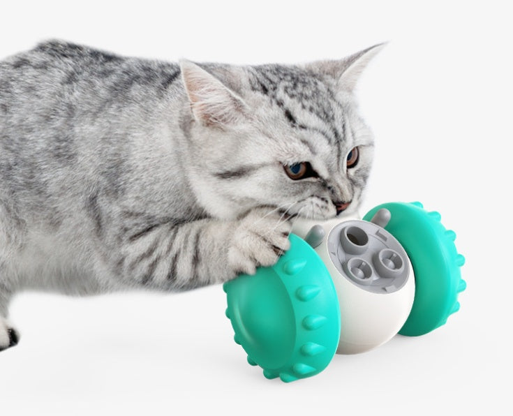Pet slow feeder toy showing kibble and treat dispensing in use