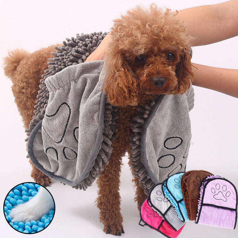 Dog wearing a gray towel with paw prints, held by a person, with close-up insets of the towel texture and color options.